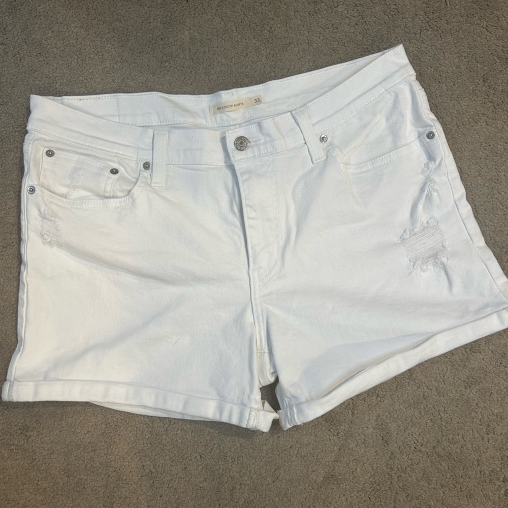 Levi’s White Denim Jean Shorts Women’s Size 33 Mid-Length Distressed Cutoff